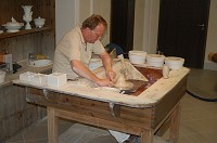  The tour also included demonstrations of how the porcelain pieces are made.  This man is a Thrower or Former.  He sets some of the basic forms using the potters wheel and molds.